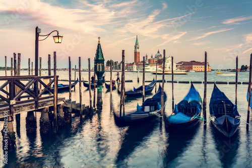Gondolas in Venice, Italy at sunset. © Photocreo Bednarek