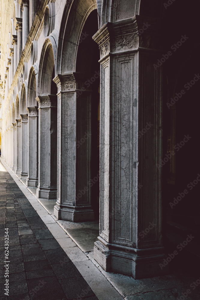 Fototapeta premium Ancient columns with arches at Palazzo Ducale or Doge's Palace in Venice, Italy