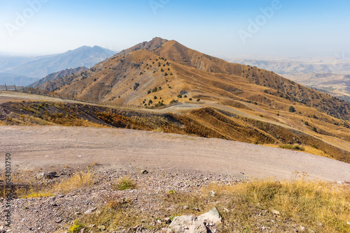 View from above. Mountain landscape of the South of Uzbekistan. Beautiful high mountains in autumn. Mountain hiking in Uzbekistan.