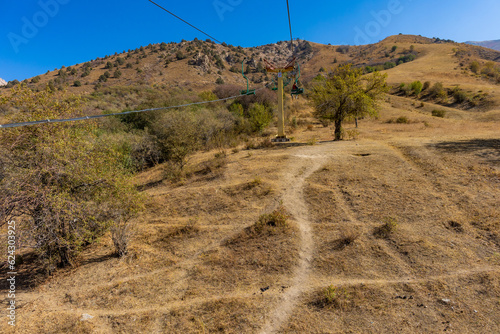 Mountain Small Chimgan in Uzbekistan. The cable car leads to the top of the mountain. Tourism in Uzbekistan. photo