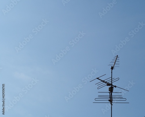 antenna against blue sky