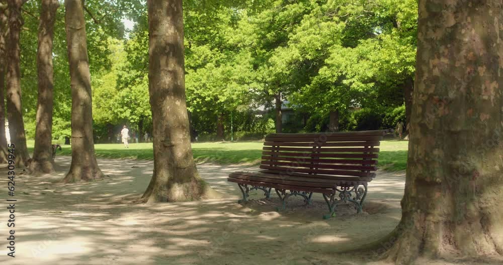 Empty Bench And Trees At The Cinquantenaire Park In Brussels, Belgium In Summer. wide