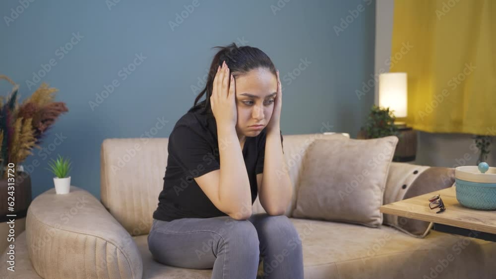 Desperate young woman with her hands on her head. Depressed. Desperate young woman with her hands on her head. Depressed.