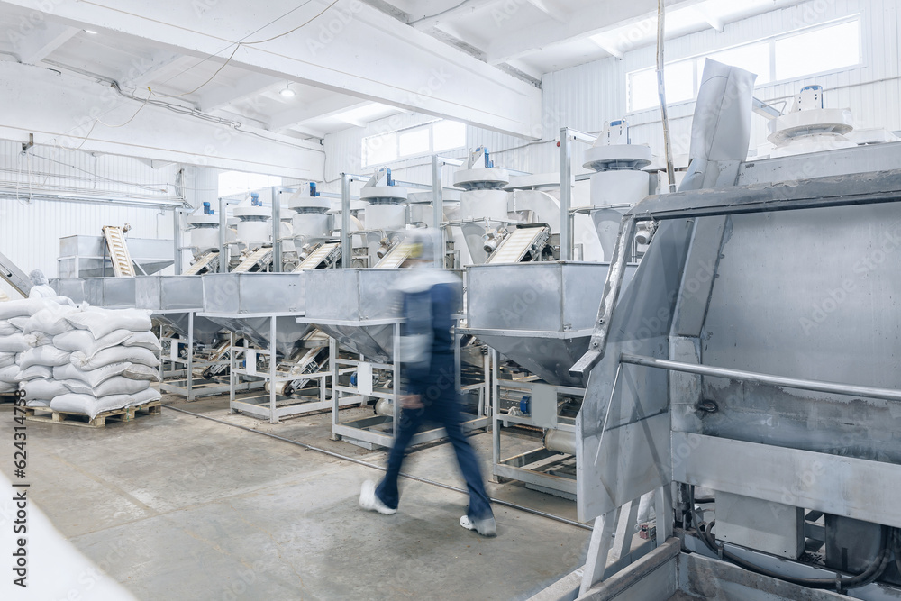 Industrial Automated production for pine nut shelling. Concept modern food industry Industrial Automated production for pine nut shelling. Concept modern food industry