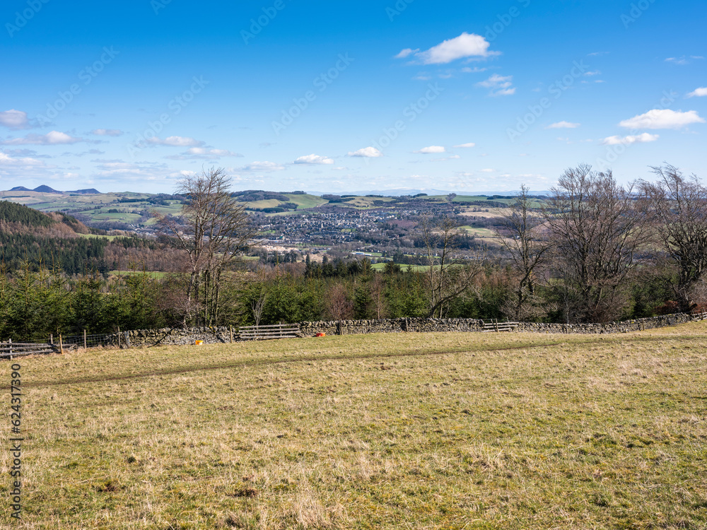 In March, a sunny distant view of the township of Selkirk on a walk on the Philiphaugh Estate, Selkirk, Scotland
