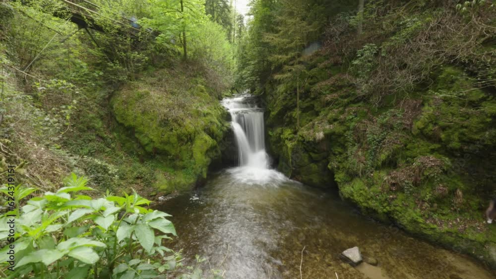 Long exposure timelapse shot of Geroldsau waterfalls creating milky effect Long exposure timelapse shot of Geroldsau waterfalls creating milky effect