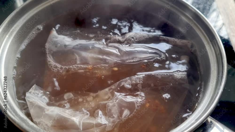 Bags of buckwheat are boiled in a saucepan Bags of buckwheat are boiled in a saucepan