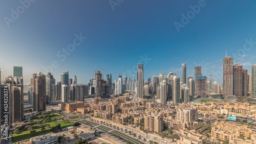 Panorama showing Dubai's business bay towers aerial morning timelapse. Rooftop view of some skyscrapers