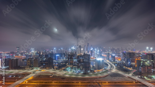 Photography Panoramic skyline of Dubai with business bay and downtown district all night timelapse