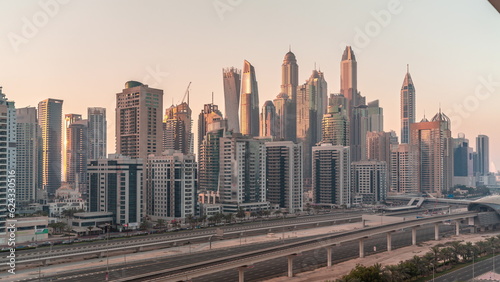 Dubai marina tallest block of skyscrapers all day timelapse. © neiezhmakov