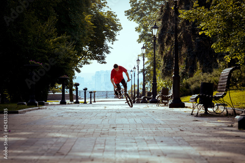 Wallpaper Mural Ukrainian bmx rider performs tricks in the middle of the city. Torontodigital.ca