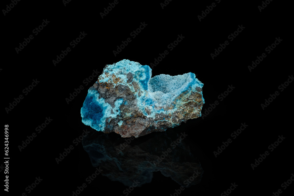 blue shattuckite isolated on black background. macro detail close-up rough raw unpolished semi-precious gemstone. blue shattuckite isolated on black background. macro detail close-up rough raw unpolished semi-precious gemstone.