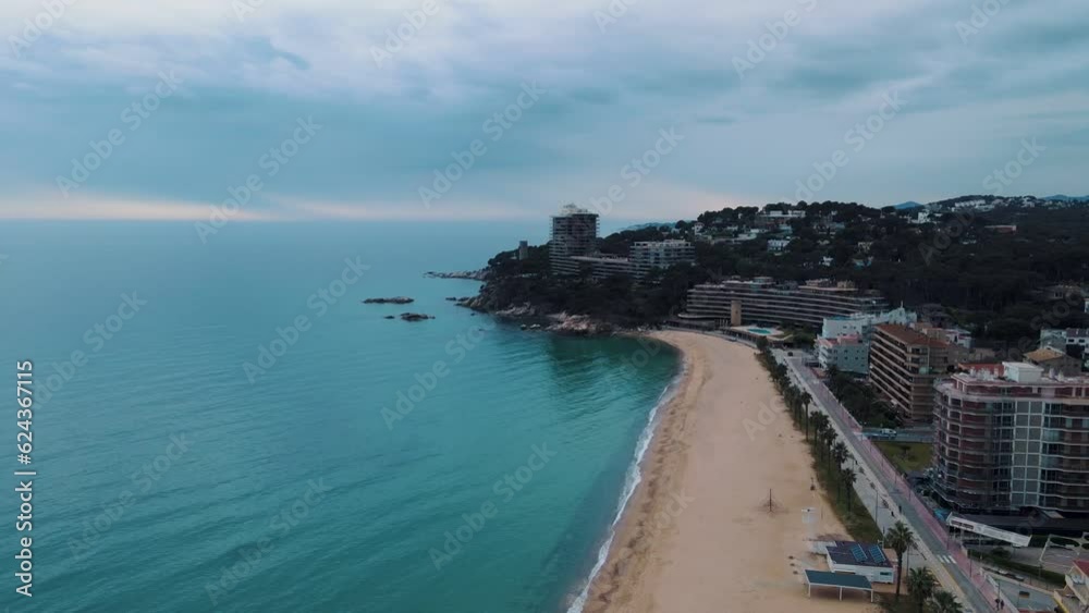 Aerial view of Palamos city at dusk during summer along Costa Brava Catalonia Aerial view of Palamos city at dusk during summer along Costa Brava Catalonia