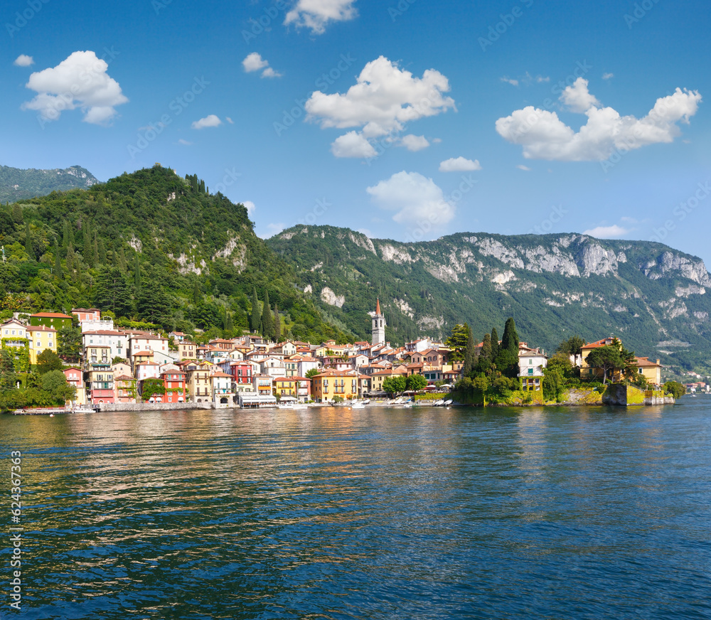 Town on Lake Como coast (Italy). Summer  view from ship board.