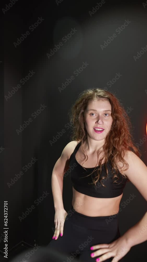 female running on elliptical orbitrek machine in fitness gym. Slow motion female running on elliptical orbitrek machine in fitness gym. Slow motion