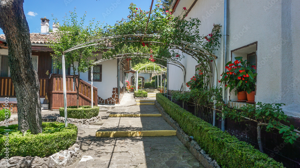 Fototapeta premium 02_The beautiful inner courtyard of the Beautiful Monastery St. Nicholas the Wonderworker, village of Arbanassi, region Veliko Tarnovo, Bulgaria. 