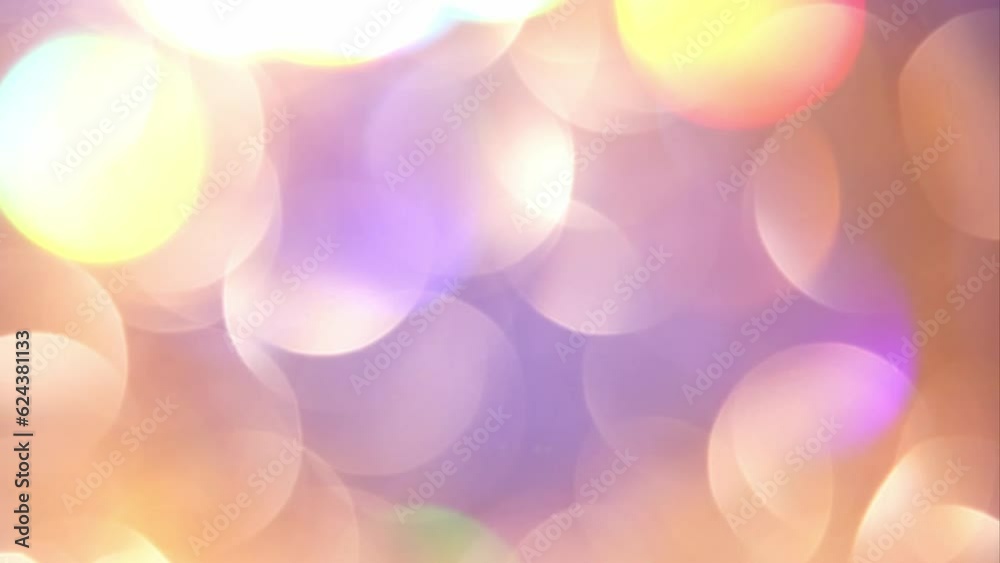 Gold Bokeh Shimmers with colorful tints shades. Blurred bokeh lights particles abstract motion background. Defocused shiny sparkling circles as a Christmas symbols. Gold Bokeh Shimmers with colorful tints shades. Blurred bokeh lights particles abstract motion background. Defocused shiny sparkling circles as a Christmas symbols.