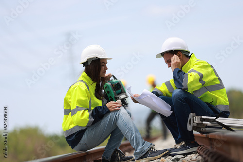 a couple of civil engineers take a rest, Relaxation after work on the rail, Survey engineer