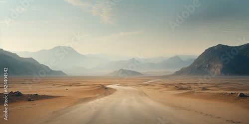Tableau sur toile A road leading into the distance in an empty and desolate landscape with, representing the journey of loneliness