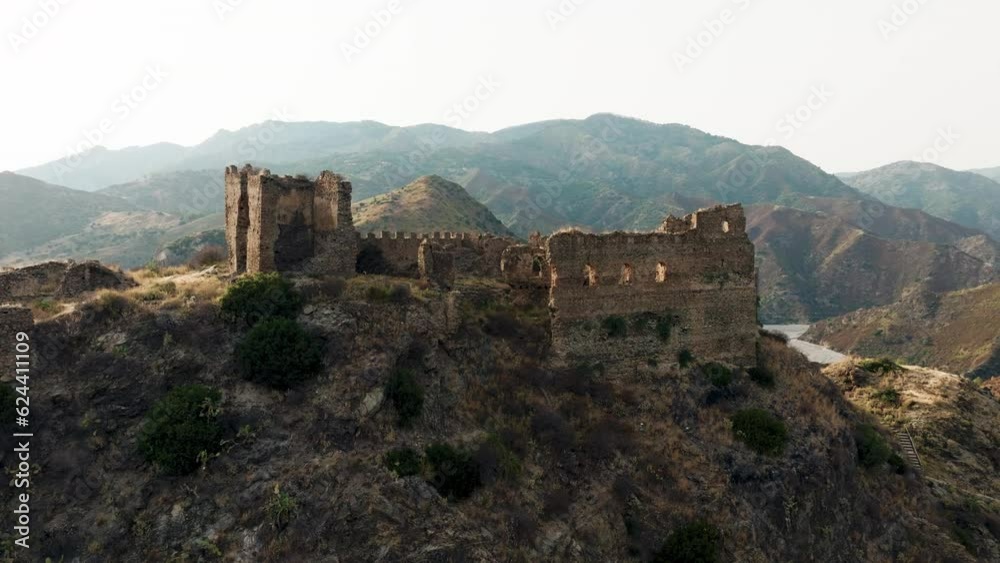 Ancient ruins of a medieval castle on top of the mountain. Amendolea Castle. Ancient ruins of a medieval castle on top of the mountain. Amendolea Castle.