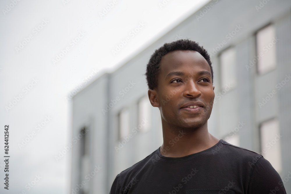 Young African Student Smiling on college campus university city life Young African Student Smiling on college campus university city life