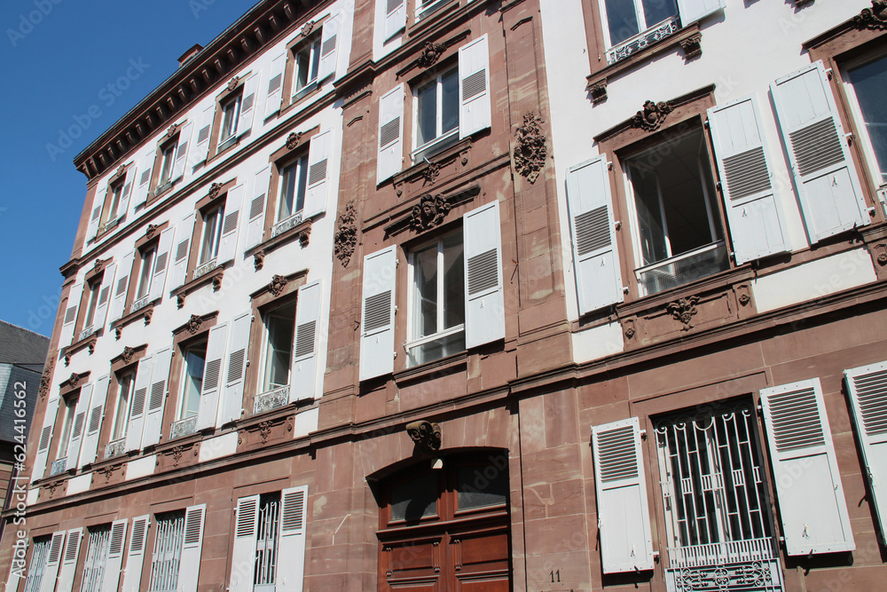 old stone flat building in strasbourg in alsace (france) old stone flat building in strasbourg in alsace (france)