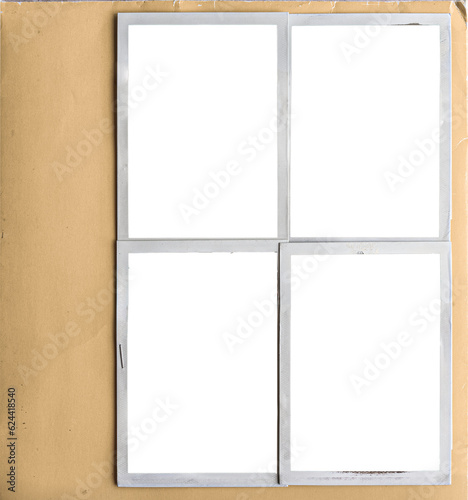 A vintage book page with four blank photo frames.