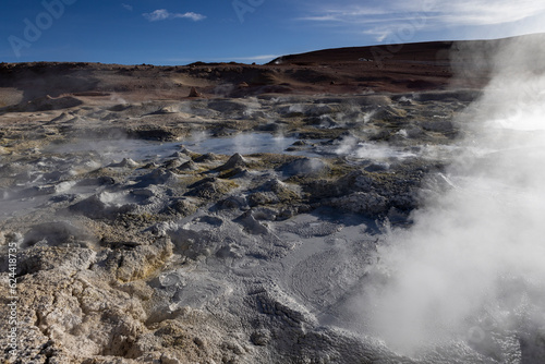 Stunning geothermic field of Sol de Mañana with its steaming geysers and hot pools with bubbling mud - just one sight on the lagoon route in Bolivia, South America