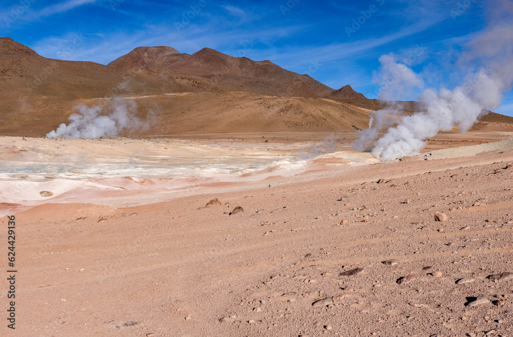 Stunning geothermic field of Sol de Mañana with its steaming geysers and hot pools with bubbling mud - just one sight on the lagoon route in Bolivia, South America