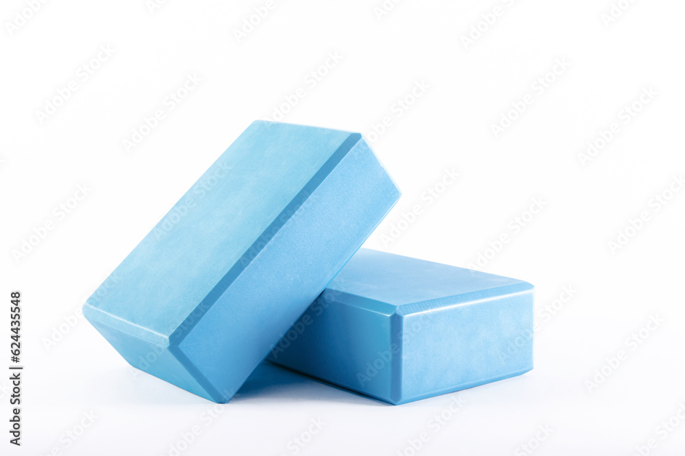 Two yoga blocks isolated on a white background with clipping path Two yoga blocks isolated on a white background with clipping path