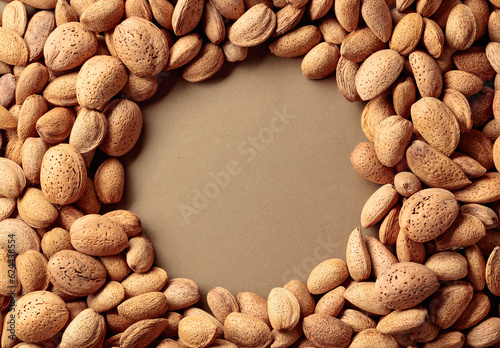 Background of big raw unpeeled almonds.