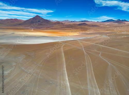 Aerial view of Laguna Colorada, famous natural sight while traveling the scenic lagoon route through the remote and beautiful Bolivian Altiplano in South America