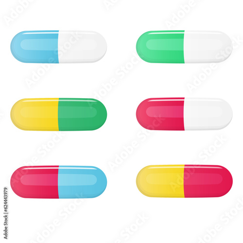 Two colors pills in capsules isolated on white background