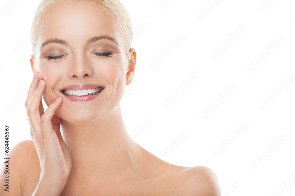 Young woman with blue eyes , blonde hair and clear skin looking at the camera with a white background behind her Young woman with blue eyes , blonde hair and clear skin looking at the camera with a white background behind her