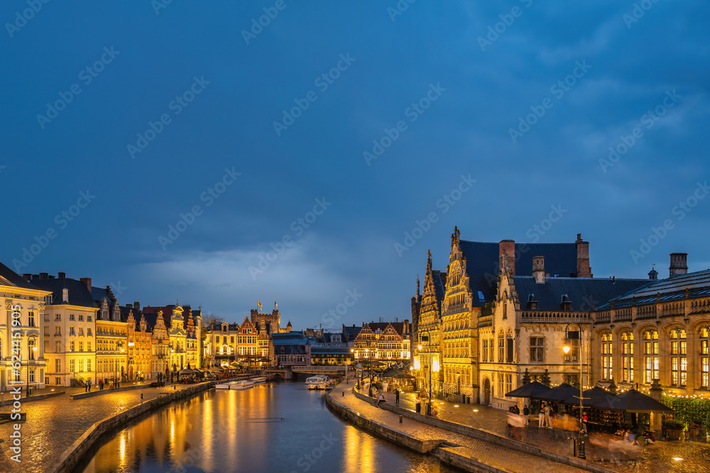 Ghent Belgium, night city skyline at St Michael's Bridge (Sint-Michielsbrug) with Leie River and Korenlei