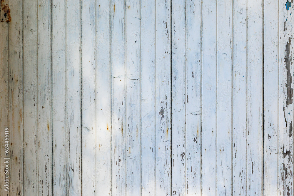 old board wall painted with white peeling paint old board wall painted with white peeling paint