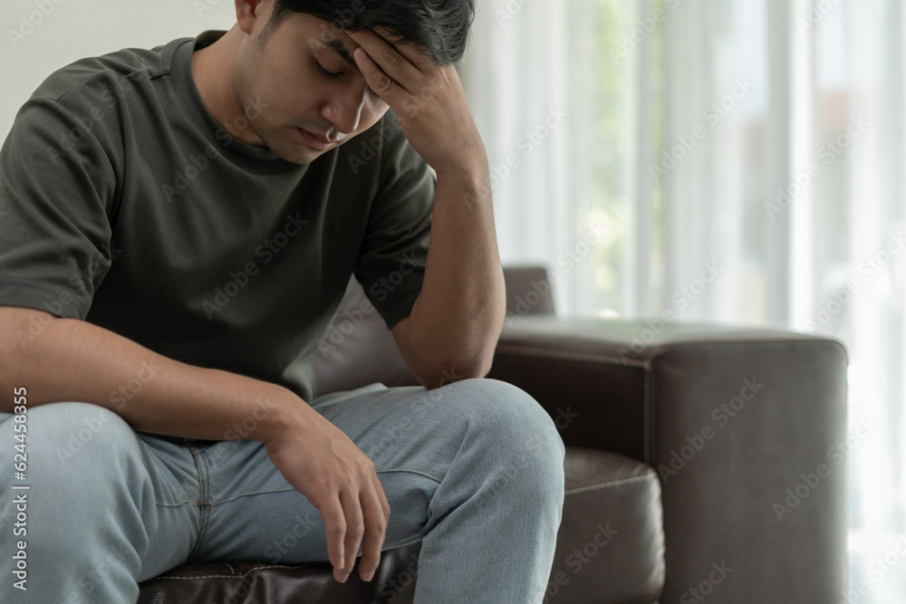 Depression and mental illness. Asian man disappoint, sad after receive bad news. Stressed boy confused with unhappy problem, arguing with girlfriend, cry and worry about unexpected work, down economy. Depression and mental illness. Asian man disappoint, sad after receive bad news. Stressed boy confused with unhappy problem, arguing with girlfriend, cry and worry about unexpected work, down economy.