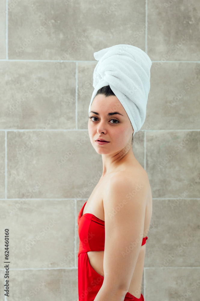 Young woman in head towel after shower Young woman in head towel after shower