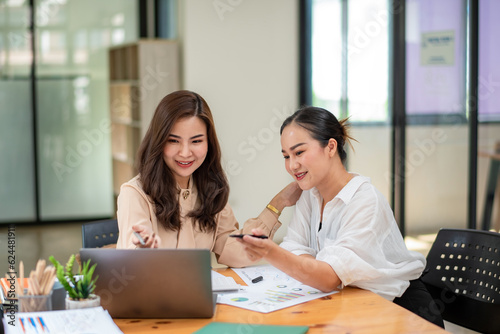 Two colleague businesswoman are meeting online, marketing plan, business plan, checking statistics and accounting.