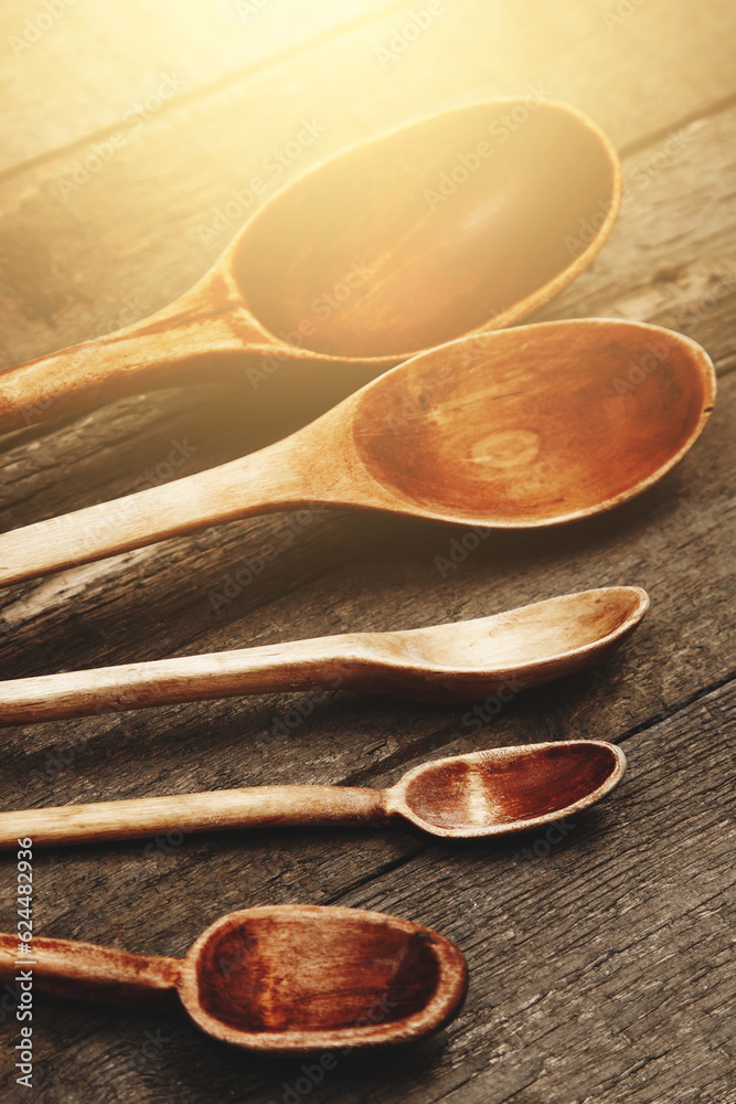 Closeup of various wooden spoons on the table Closeup of various wooden spoons on the table