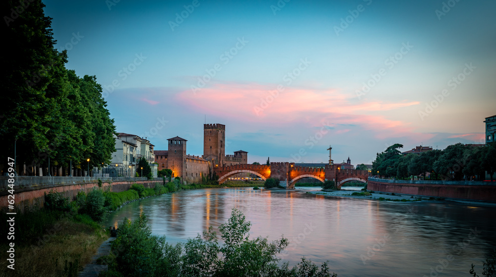 Ponte di Castelvecchio bridge in Verona on the Adigi River at sunset