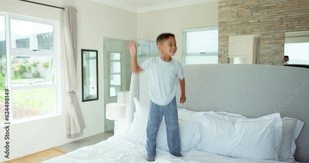 Fun, happiness and child jumping on bed with playful energy, freedom and excited in morning at home. Smile, holiday and happy kid in bedroom, weekend celebration and boy playing game in apartment. Fun, happiness and child jumping on bed with playful energy, freedom and excited in morning at home. Smile, holiday and happy kid in bedroom, weekend celebration and boy playing game in apartment.
