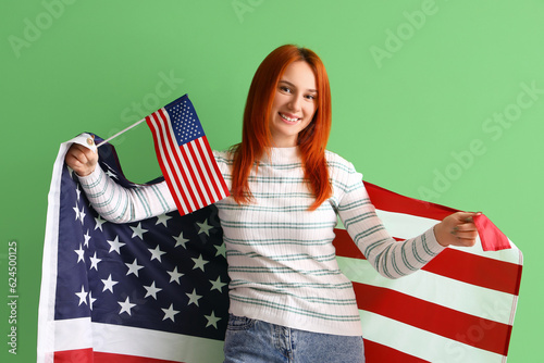 Young redhead woman with US...