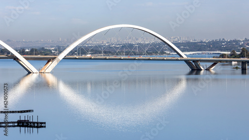 View of north side of the bridge over the lake. JK Bridge. Brasília, capital of Brazil. Cityscape. Clouds in the sky.
