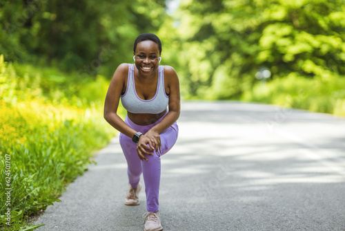 Black woman, stretching legs, fitness for exercise workout motivation or runner sports warm up. African woman, happy athlete and running wellness goal or cardio stretch in nature.