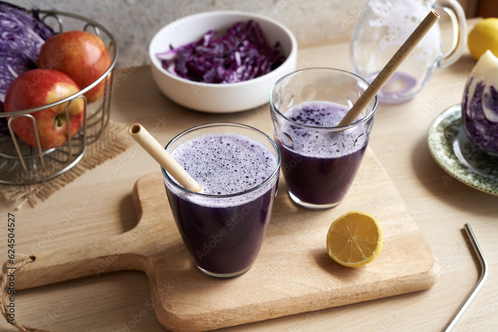 Purple cabbage juice with bamboo straws Purple cabbage juice with bamboo straws