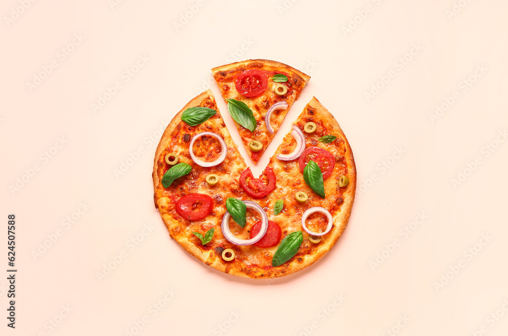 Tasty pizza with olives, tomatoes and basil on beige background