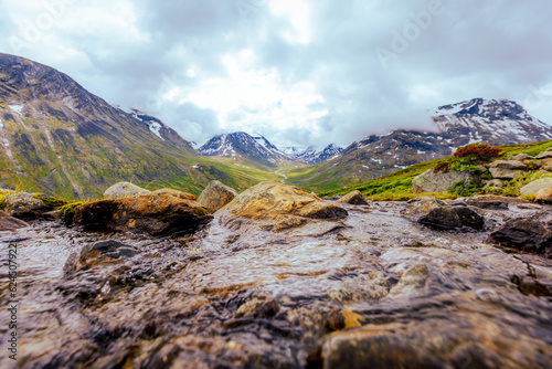 Galdhopiggen, Norway - July 3rd, 2023: The mountain landscape on the hike to the peak of Galdhopiggen In Jotunheimen National Park, Norway