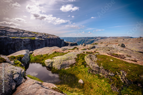 Kjerag, Norway - July 5th, 2023: The epic mountain landscape on the famous Kjerag hike in southern Norway