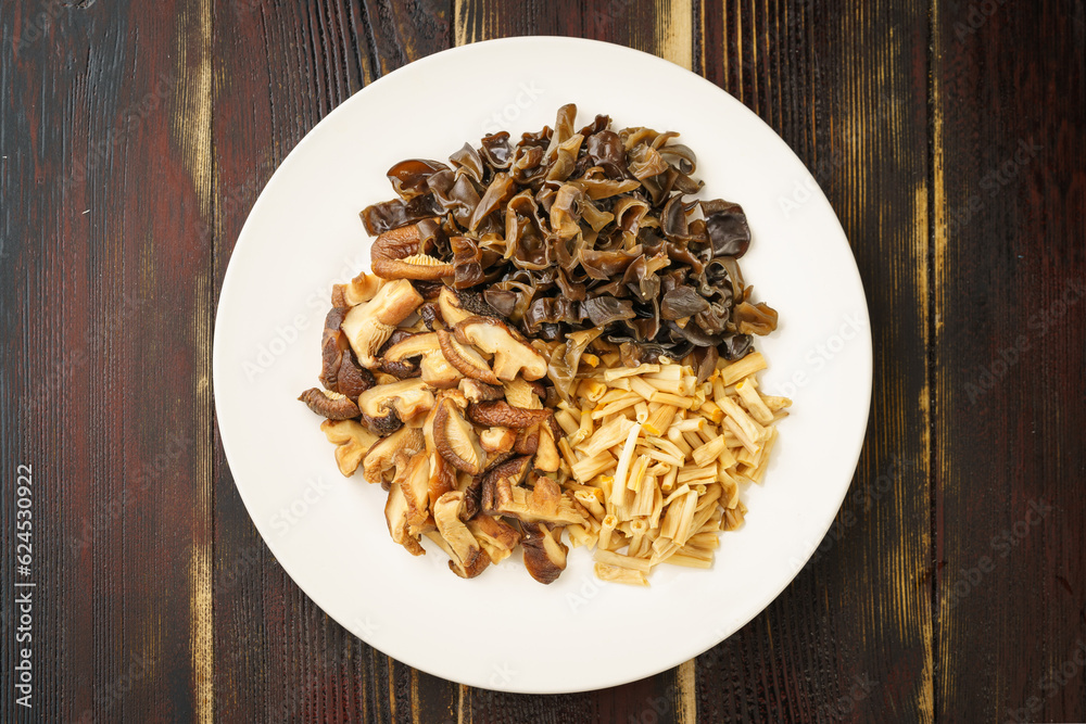 Various dried mountain delicacies on a monochrome background